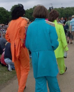 [People dressed as the Beatles from the Sergeant Pepper era]